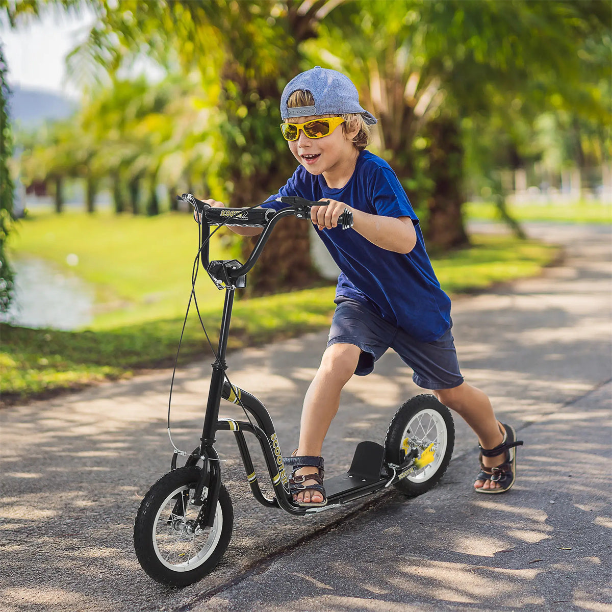 Ride and Slide 12-inch children's scooter with adjustable height. -  Black